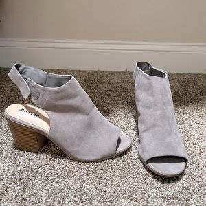 Grey opened toed heeled boots